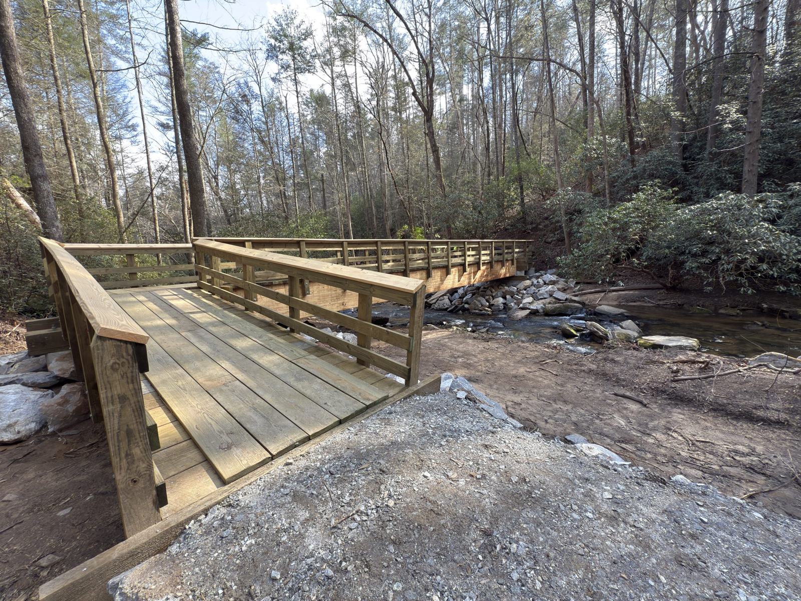 Boardwalk approach leading onto a new trail bridge