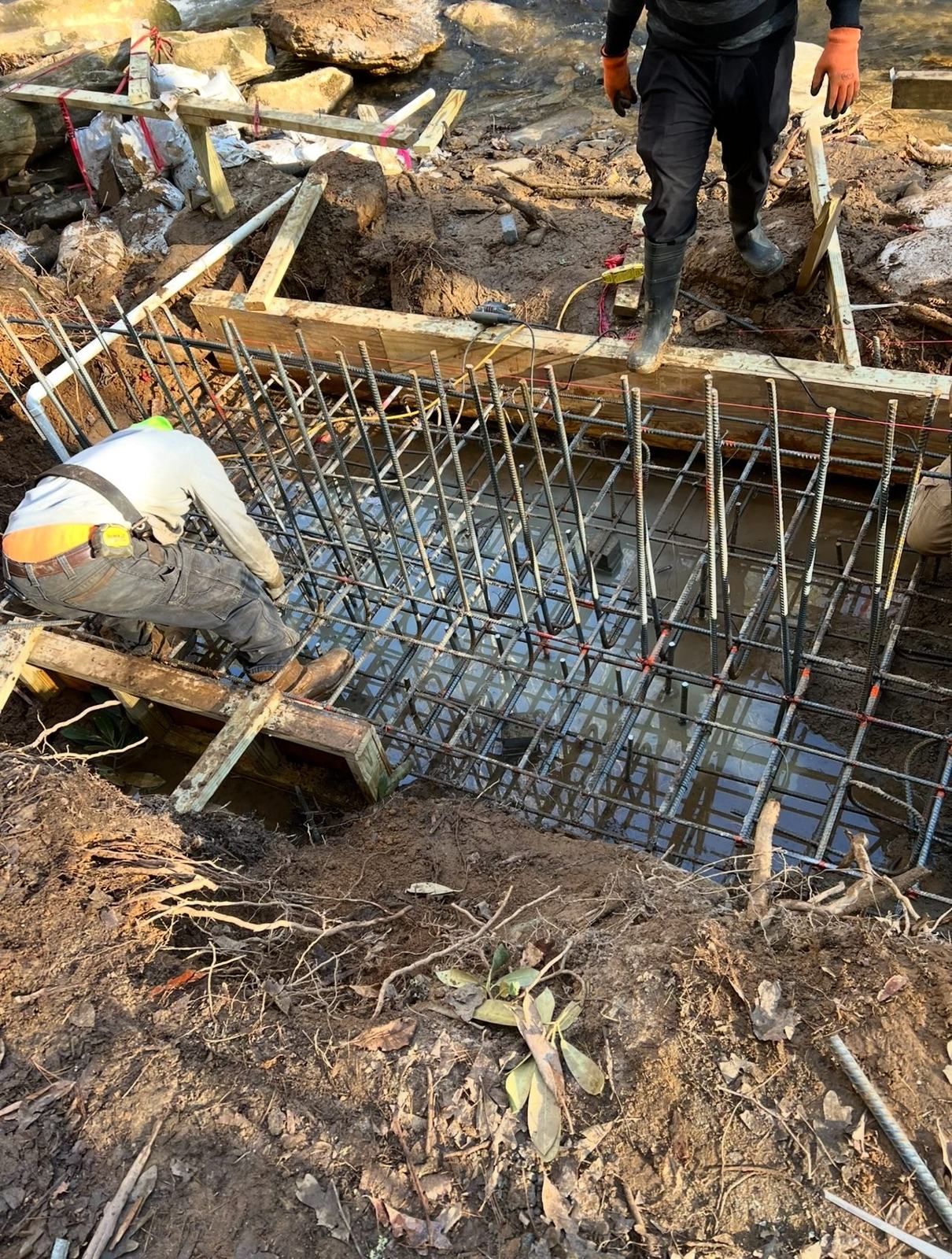 Rebar mat set for a footing beside the creek